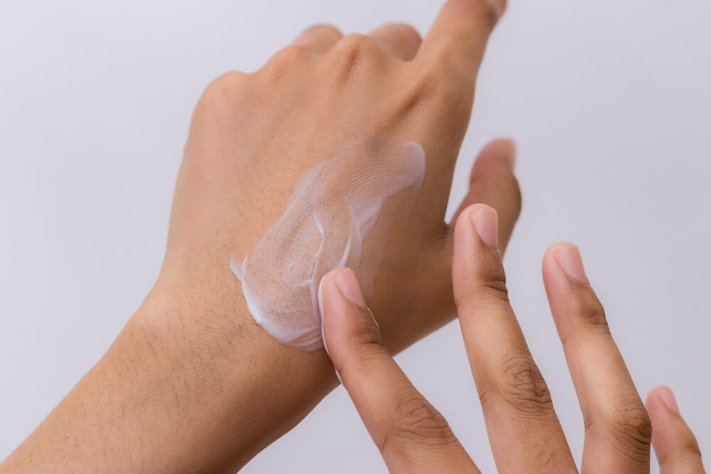 hands with white cream texture (1)